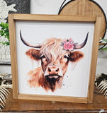 Hyland Cow with Floral Accent